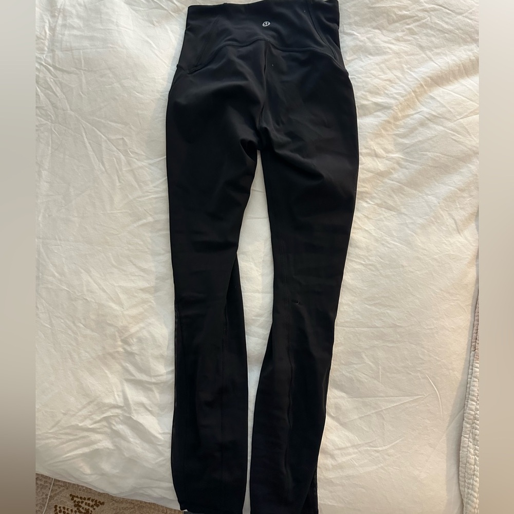 Lululemon black leggings with mesh detail. Wunder material. Size 2